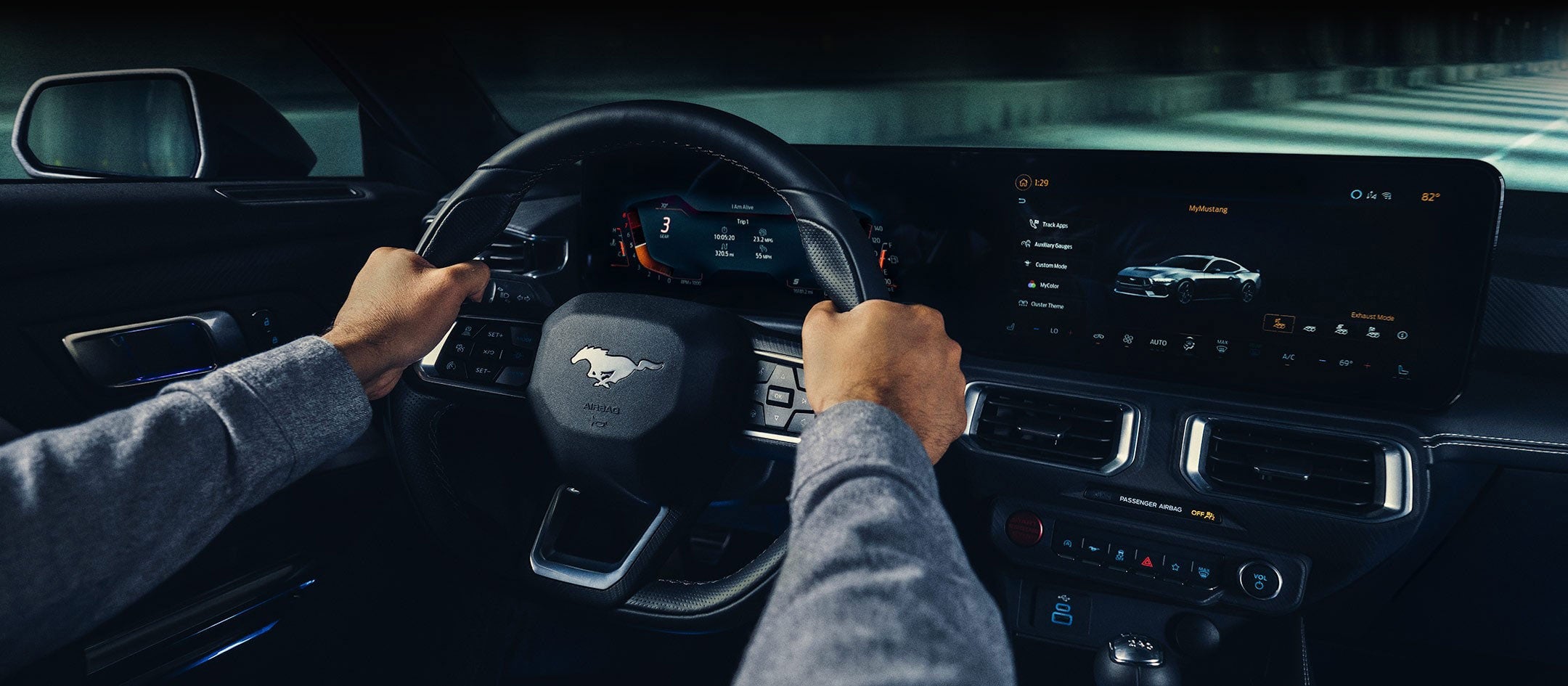 A 2024 Ford Mustang® model interior with a person driving | Zook Motors in Kane PA